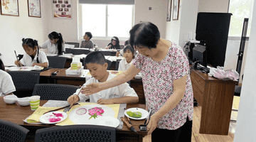 泰州姜堰罗塘街道:侨心一片系桑梓 墨香满堂润童心