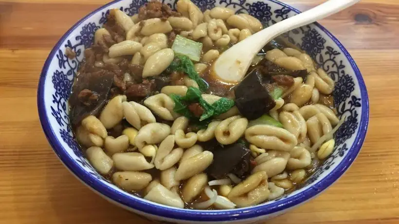 被钟爱千年的山西猫耳朵:从北魏到现代的指尖面食传奇