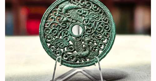 古代滇地镂空钱鉴赏第七弹 观众可品绿孔雀化身鸾凤的吉祥古钱
